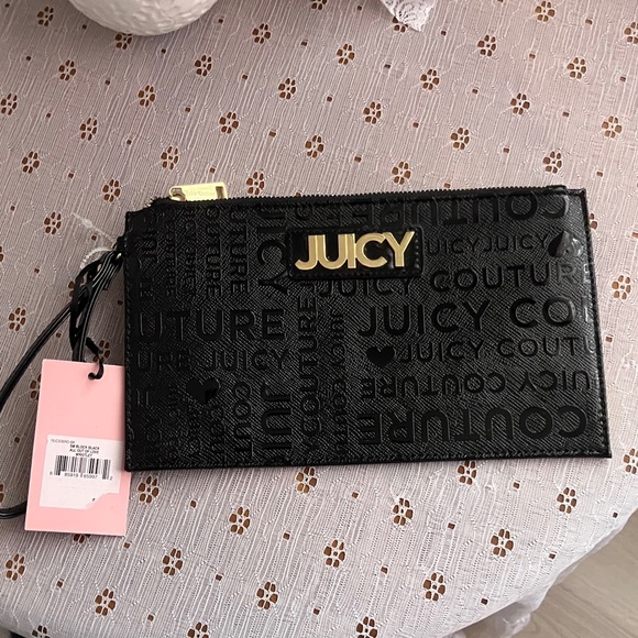 Juicy Couture Handbags - Juicy Couture Embossed Black Pouch wristlet